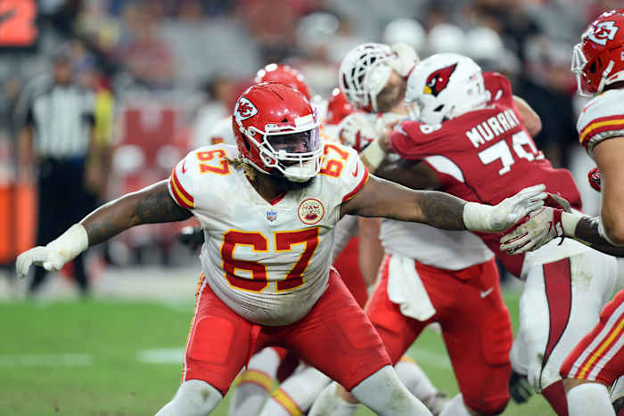 Aug 20, 2021; Glendale, Arizona, USA; Kansas City Chiefs offensive tackle Lucas Niang (67) blocks against the Arizona Cardinals during the first half at State Farm Stadium. Mandatory Credit: Joe Camporeale-USA TODAY Sports